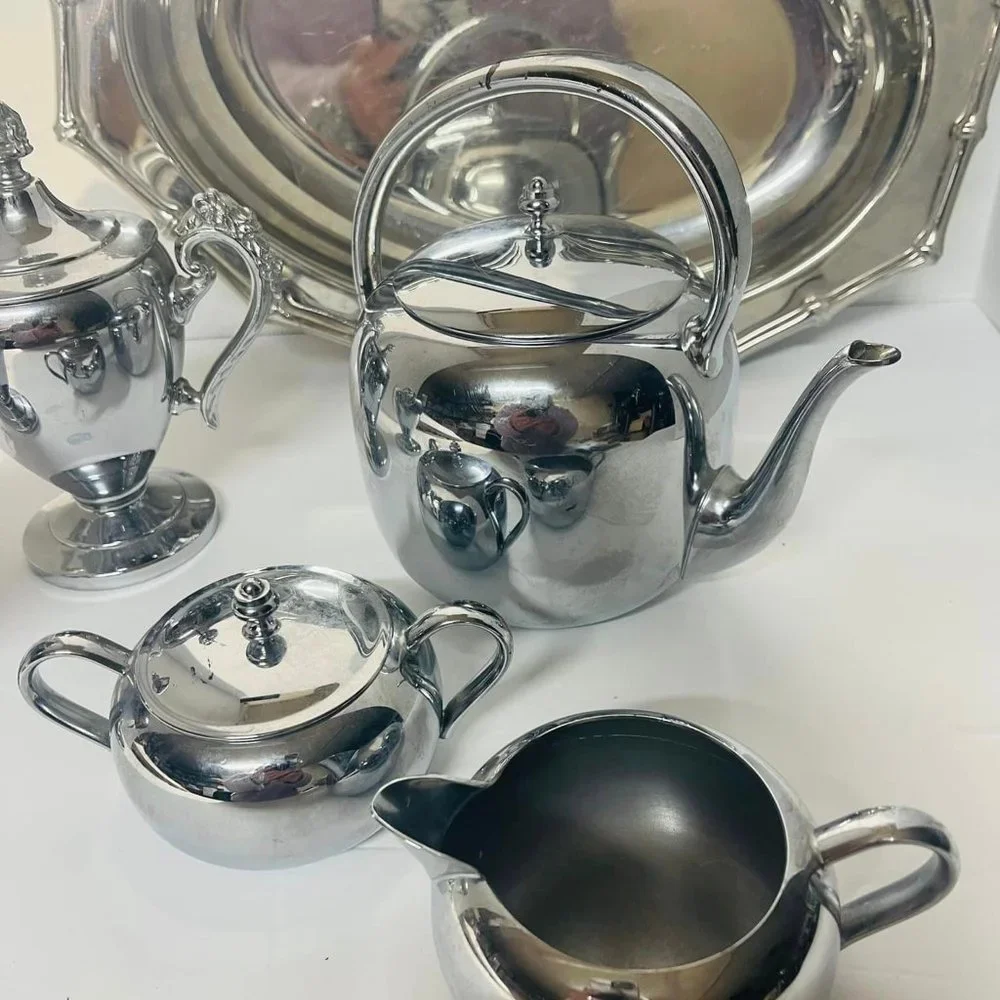 Silverplated ~stainless steel pieces. Tray, Teapot, 2 Sugar Bowls, 2 Creamers ~